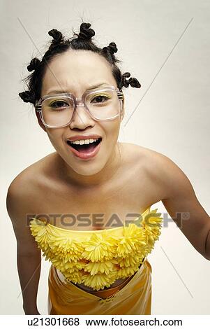 Young Woman Wearing Glasses, High Angle View View Large Photo Image Stock Photo - Young Woman Wearing Glasses, High Angle View. Fotosearch