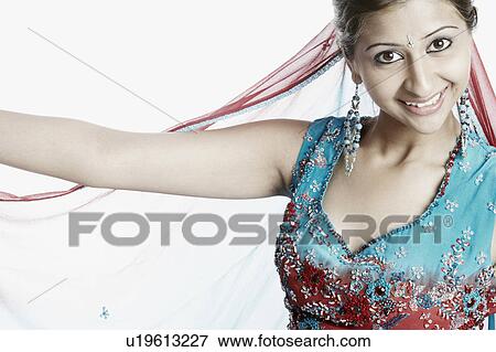 Stock Photo - Portrait of a young woman smiling. Fotosearch
