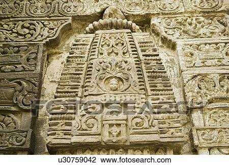 Stock Image - Carvings on a wall, Lakshmi Narayan Temple Complex, Chamba, Himachal Pradesh, India. Fotosearch