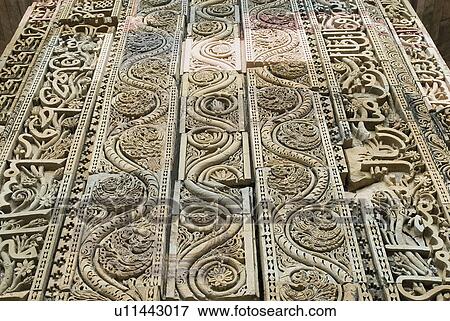 Close-up of an engraved stone panel in a monument, Qutab Minar, New Delhi, India View Large Photo Image Stock Photo - Close-up of an engraved stone panel in a monument, Qutab Minar, New Delhi, India. Fotosearch