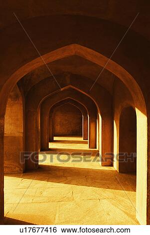 Stock Photograph - Colonnade inside a monument, Safdarjung Tomb, New Delhi, India. Fotosearch