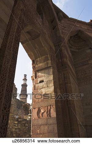 Low angle view of a tower monument, Qutab Minar, New Delhi, India View Large Photo Image Picture - Low angle view of a tower monument, Qutab Minar, New Delhi, India. Fotosearch
