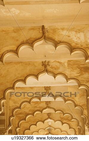 Stock Photograph - Low angle view of an arched ceiling. Fotosearch