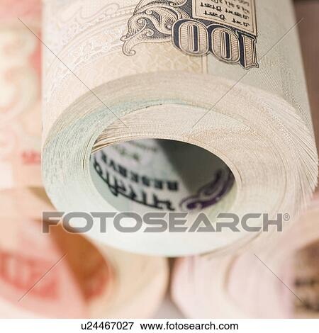 Close-up of a stack of rolled up Indian banknotes View Large Photo Image Stock Photo - Close-up of a stack of rolled up Indian banknotes. Fotosearch