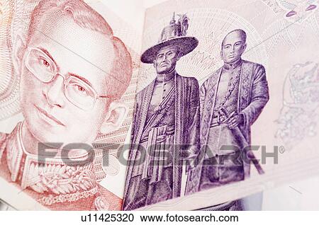 Stock Image - Close-up of a Thai baht banknote. Fotosearch