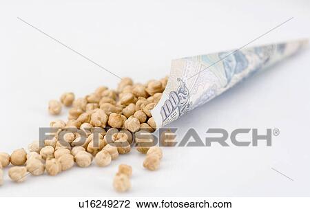 Close-up of Chick-peas spilling out of a cone of an Indian one hundred rupee banknote View Large Photo Image Stock Image - Close-up of Chick-peas spilling out of a cone of an Indian one hundred rupee banknote. Fotosearch