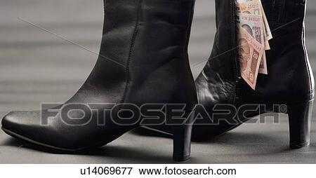 Stock Photo - Close-up of Indian banknotes of different denominations in a boot. Fotosearch