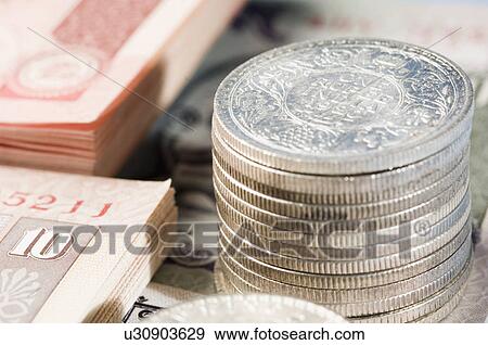 Close-up of Indian banknotes with a stack of antique coins View Large Photo Image Stock Photo - Close-up of Indian banknotes with a stack of antique coins. Fotosearch