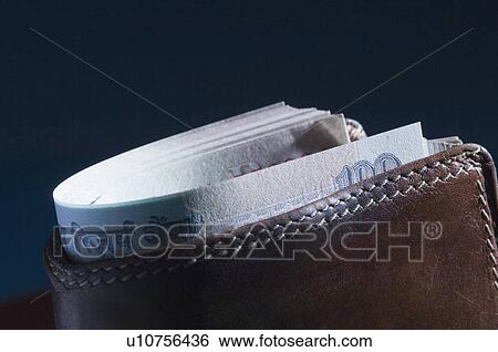 Close-up of Indian one hundred rupee banknotes in a wallet View Large Photo Image Stock Photograph - Close-up of Indian one hundred rupee banknotes in a wallet. Fotosearch