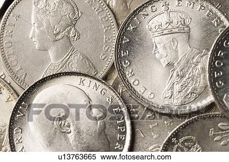 Stock Photography - Close-up of Indian silver coins. Fotosearch
