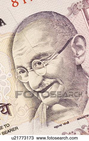 Stock Image - Close-up of Mahatma Gandhi on an Indian fifty rupee banknote. Fotosearch