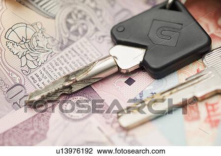 High angle view of car keys on Indian banknotes View Large Photo Image Stock Image - High angle view of car keys on Indian banknotes. Fotosearch