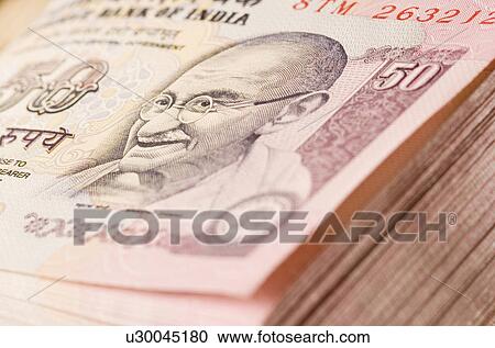 Stack of Indian fifty rupee banknotes View Large Photo Image Stock Image - Stack of Indian fifty rupee banknotes. Fotosearch