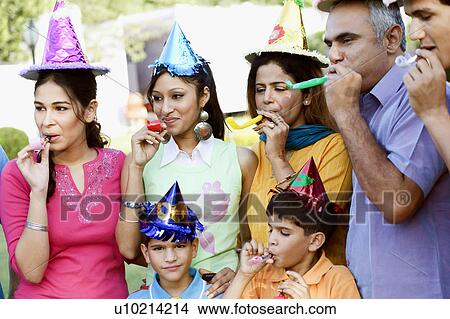 Picture - Group of people celebrating a birthday party. Fotosearch