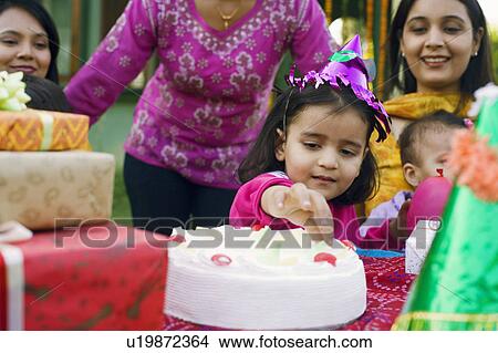 Picture - Group of people celebrating a birthday party. Fotosearch