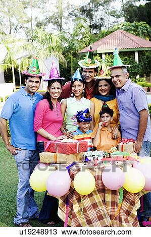 Group of people celebrating a birthday party View Large Photo Image Stock Image - Group of people celebrating a birthday party. Fotosearch