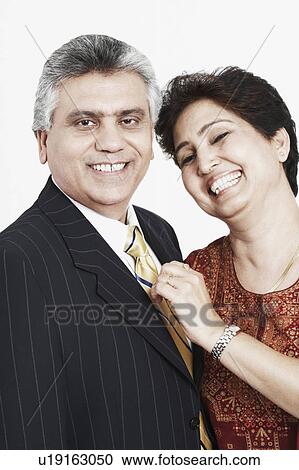 Portrait of a mature couple smiling View Large Photo Image Stock Image - Portrait of a mature couple smiling. Fotosearch