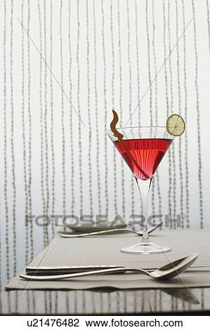 Close-up of a glass of martini View Large Photo Image Stock Image - Close-up of a glass of martini. Fotosearch