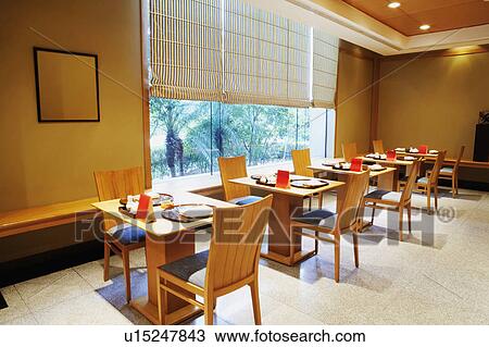 Stock Image - High angle view of place setting in a restaurant. Fotosearch