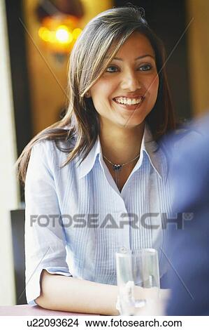 Portrait of a young couple eating Japanese food and smiling View Large Photo Image Picture - Portrait of a young couple eating Japanese food and smiling. Fotosearch