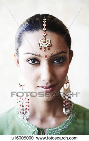 Portrait of a young woman thinking View Large Photo Image Stock Image - Portrait of a young woman thinking. Fotosearch