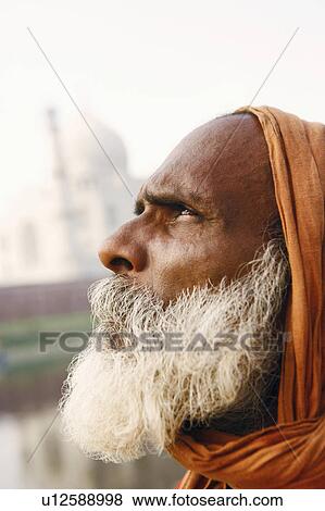Close-up of a priest looking up, Taj Mahal, Agra, Uttar Pradesh, India View Large Photo Image Stock Photo - Close-up of a priest looking up, Taj Mahal, Agra, Uttar Pradesh, India. Fotosearch