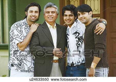 Portrait of a mature man and his three sons smiling View Large Photo Image Stock Image - Portrait of a mature man and his three sons smiling. Fotosearch