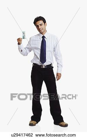 Portrait of a businessman showing a circuit board and smiling View Large Photo Image Stock Image - Portrait of a businessman showing a circuit board and smiling. Fotosearch