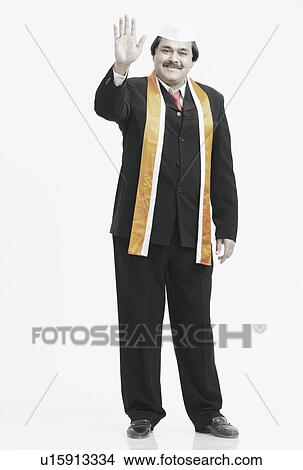 Portrait of a mature man waving View Large Photo Image Picture - Portrait of a mature man waving. Fotosearch