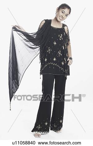 Portrait of a young woman holding her stole View Large Photo Image Stock Image - Portrait of a young woman holding her stole. Fotosearch