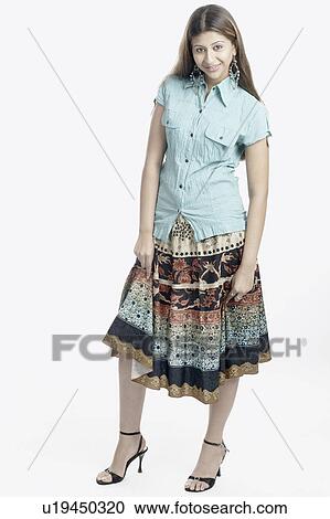 Stock Image - Portrait of a young woman posing. Fotosearch