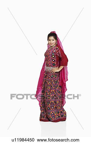 Stock Image - Portrait of a young woman smiling. Fotosearch