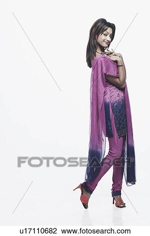 Stock Image - Portrait of a young woman smiling. Fotosearch