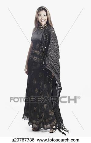 Stock Photograph - Portrait of a young woman smiling. Fotosearch