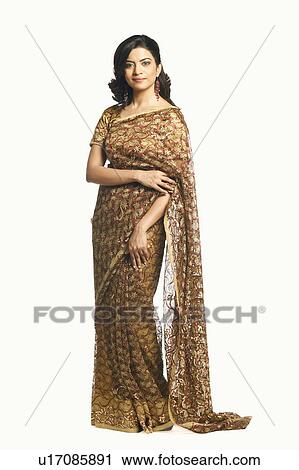 Stock Image - Portrait of a young woman wearing a sari. Fotosearch