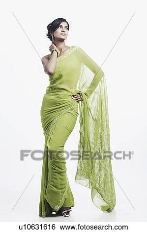 Young woman posing View Large Photo Image Stock Photograph - Young woman posing. Fotosearch