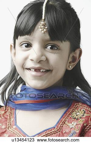 Stock Image - Close-up of a girl smiling. Fotosearch