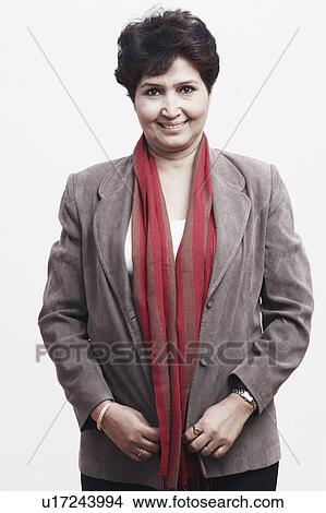 Portrait of a mature woman smiling View Large Photo Image Picture - Portrait of a mature woman smiling. Fotosearch