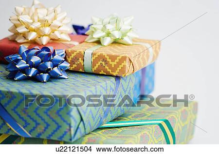 Picture - Close-up of a stack of gifts. Fotosearch