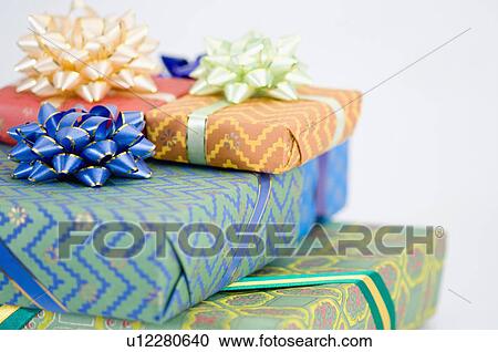 Close-up of a stack of gifts View Large Photo Image Stock Image - Close-up of a stack of gifts. Fotosearch