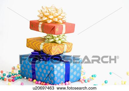 Close-up of a stack of gifts View Large Photo Image Stock Image - Close-up of a stack of gifts. Fotosearch