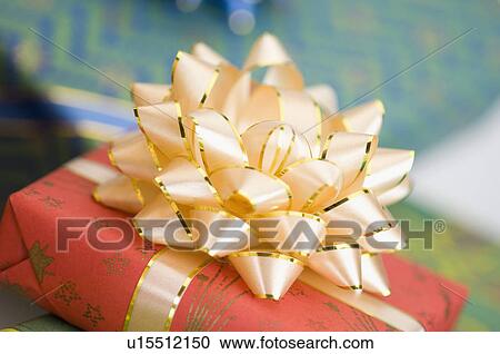 Close-up of the bow of a gift View Large Photo Image Stock Image - Close-up of the bow of a gift. Fotosearch