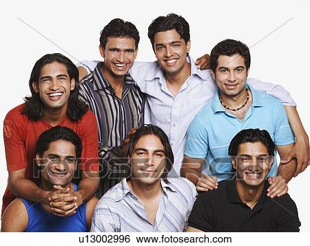 Stock Photograph - Group of young men smiling. Fotosearch