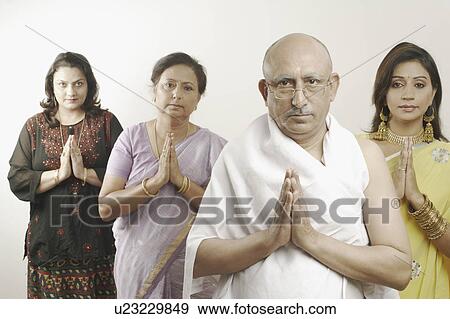 Mature man and three women in a prayer position View Large Photo Image Stock Photo - Mature man and three women in a prayer position. Fotosearch