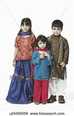 Stock Photo - Portrait of a boy and his two sisters. Fotosearch