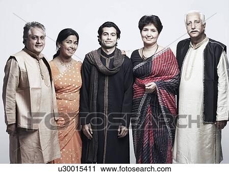 Stock Image - Portrait of a family standing together. Fotosearch