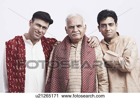 Portrait of a father and his two sons smiling View Large Photo Image Stock Image - Portrait of a father and his two sons smiling. Fotosearch