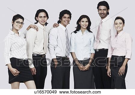 Stock Photo - Portrait of a group of business executives smiling. Fotosearch