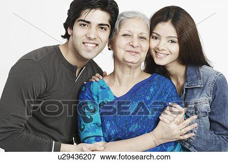 Stock Photo - Portrait of a mature woman and her two grandchildren. Fotosearch