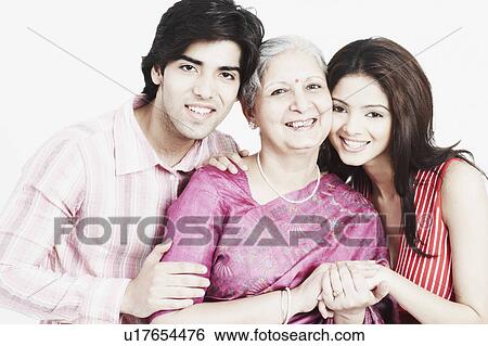 Portrait of a mature woman with her two grandchildren View Large Photo Image Stock Photograph - Portrait of a mature woman with her two grandchildren. Fotosearch